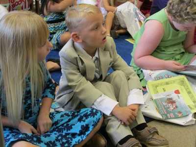 Library kids at Lakeport Library’s awards party are eager to receive their prizes. Courtesy photo. summer2013kidinsuit