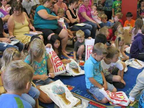 Children, parents and grandparents packed Lakeport Library’s children’s room for the summer reading program’s awards party. Courtesy photo. summer2013kidsparty