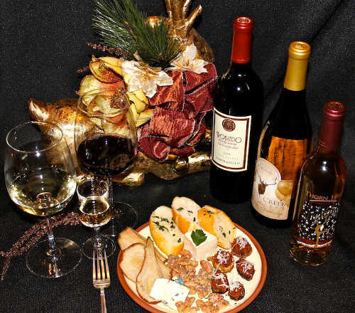 The offerings at the December 2013 Local Cuisine Scene at the Lake County Wine Studio in Upper Lake, Calif. Photo courtesy of Susan Feiler. dec2013localcusinescene