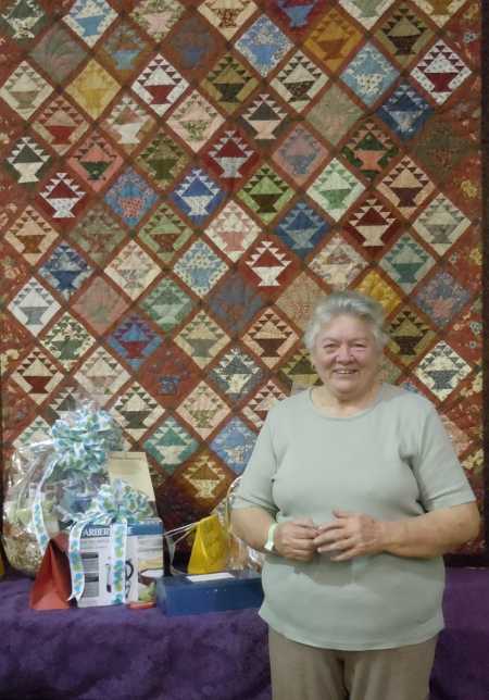 Quepha Arnold won the “Little Baskets” opportunity quilt at the Falling Leaves Quilt Show, which took place Saturday, October 5, and Sunday, October 6, 2013, in Lakeport, Calif. Photo by Connie Cracraft photo. 2013quiltshowarnold