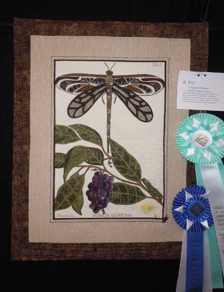 The quilt show judges named “Dragonfly Botanical” by Tami Benevedes-Graeber as Best of Show with its delicate, intricate appliqué. The Falling Leaves Quilt Show took place Saturday, October 5, and Sunday, October 6, 2013, in Lakeport, Calif. Photo by Connie Cracraft photo. 2013quiltshowdragonfly