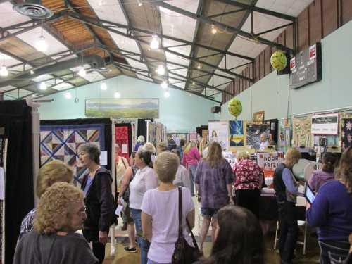 Crowds of quilt lovers explored the quilt display, the vendor mall and other attractions at the Falling Leaves Quilt Show, which took place Saturday, October 5, and Sunday, October 6, 2013, in Lakeport, Calif. This year’s attendance topped 2012’s by at least 75 people. Photo by Jan Cook. 2013quiltshowview