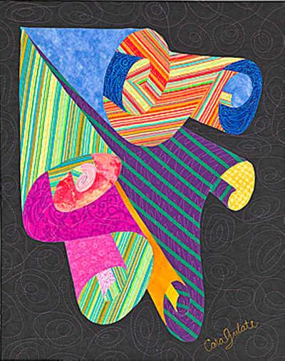 Cara Gulati’s swirling scroll quilt designs rely on brilliant combinations of colors and prints to create a 3D look. quiltguildrainbowwaterfall
