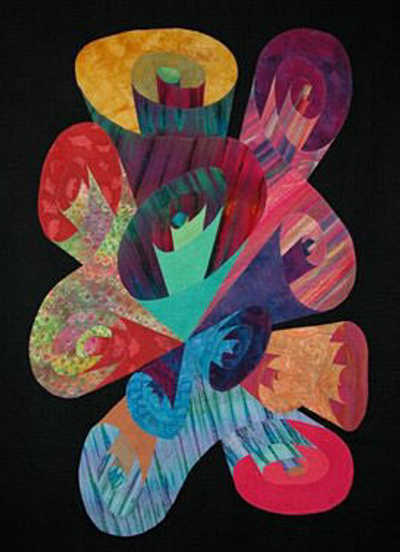 Cara Gulati says that this is the quilt that started her 3D Explosion series and that exploring swirls and perspective inspires her to create great quilt designs. quiltguildscrolls