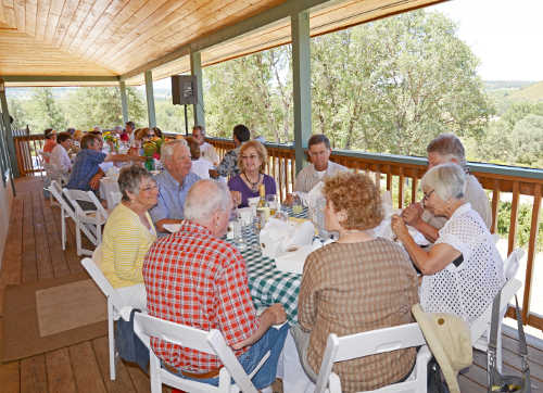 Guests enjoying the June 2013 Picnic on the Porch on the Ely Stage porch in Kelseyville, Calif. Photo by Greg Blinn. elyporchpicnic